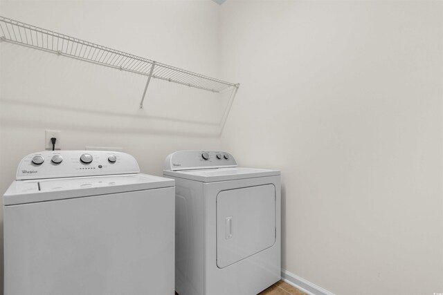 1562 Palmina Loop Unit B, Myrtle Beach, SC 29588 - laundry area with independent washer and dryer and baseboards