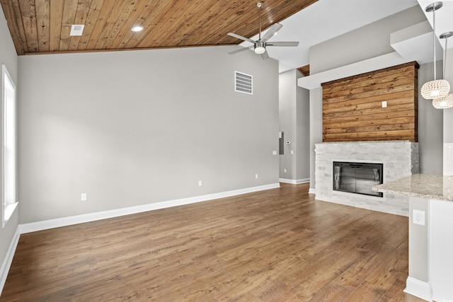 428 Meadow View Ct, Longs, SC 29568 - unfurnished living room featuring wooden ceiling, ceiling fan, wood finished floors, a fireplace, and baseboards