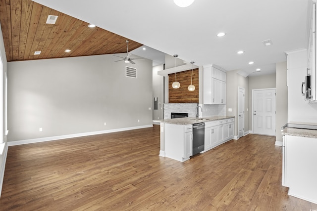 428 Meadow View Ct, Longs, SC 29568 - kitchen with open floor plan, appliances with stainless steel finishes, ceiling fan, white cabinets, and baseboards