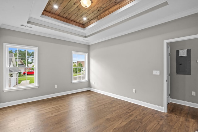 428 Meadow View Ct, Longs, SC 29568 - empty room with a raised ceiling, electric panel, wood ceiling, dark wood-type flooring, and crown molding
