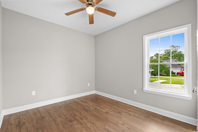 428 Meadow View Ct, Longs, SC 29568 - spare room with baseboards, wood finished floors, and a ceiling fan