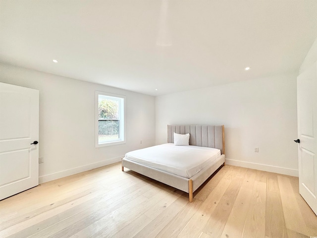 bedroom featuring light wood-type flooring