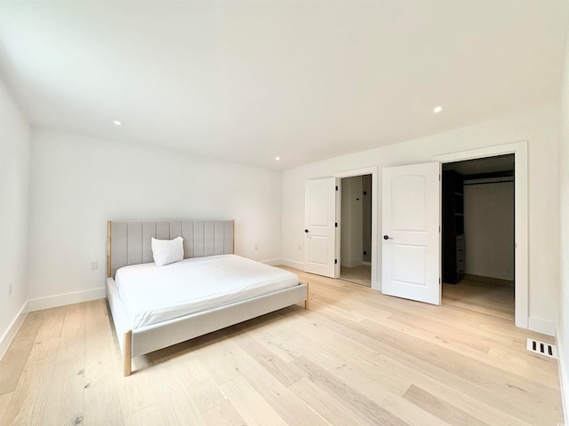 bedroom featuring light hardwood / wood-style flooring