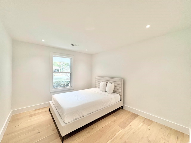 bedroom featuring light wood-type flooring