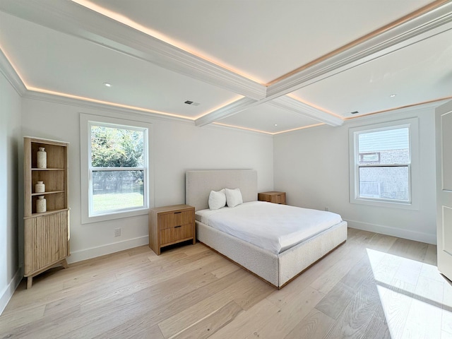 bedroom with ornamental molding, light hardwood / wood-style flooring, beamed ceiling, and coffered ceiling