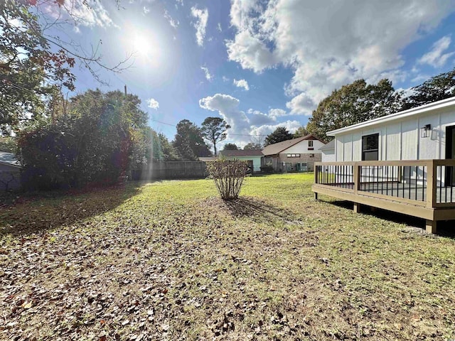 view of yard featuring a wooden deck