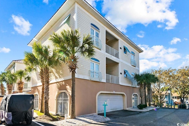 view of property featuring a garage