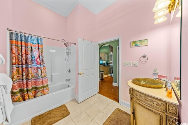 304 76th Ave N Unit D, Myrtle Beach, SC 29572 - bathroom featuring crown molding, shower / tub combo with curtain, tile patterned floors, vanity, and baseboards