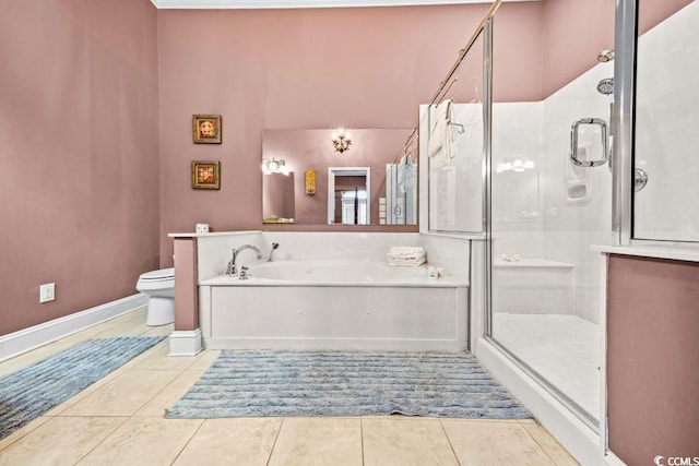 bathroom with tile patterned floors, toilet, and shower with separate bathtub