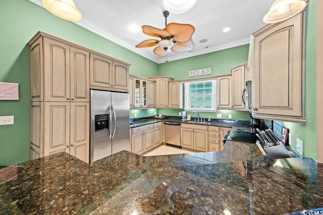 304 76th Ave N Unit D, Myrtle Beach, SC 29572 - kitchen featuring appliances with stainless steel finishes, a sink, a ceiling fan, ornamental molding, and glass insert cabinets