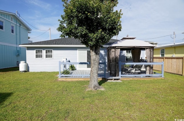 309 21st Ave N, North Myrtle Beach, SC 29582 - rear view of property with a gazebo, a wooden deck, and roof with shingles