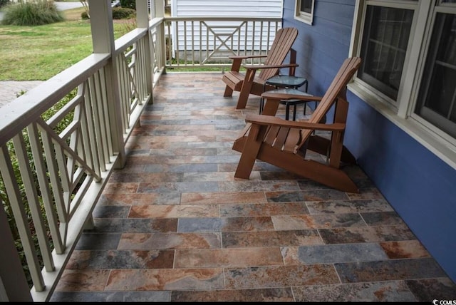 balcony featuring covered porch