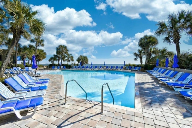 view of pool featuring a patio area