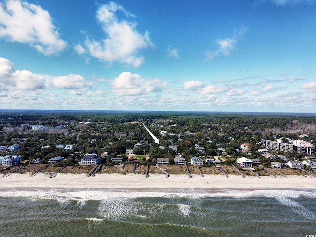 aerial view with a water view and a beach view