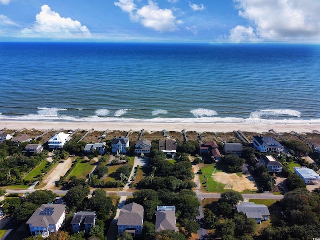 bird's eye view with a beach view and a water view