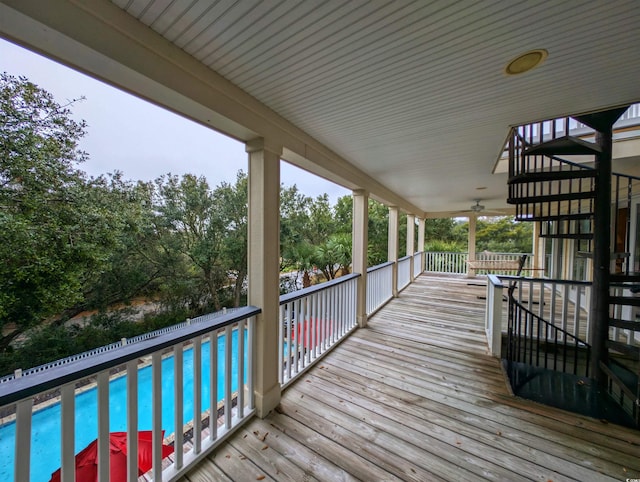 wooden deck with ceiling fan