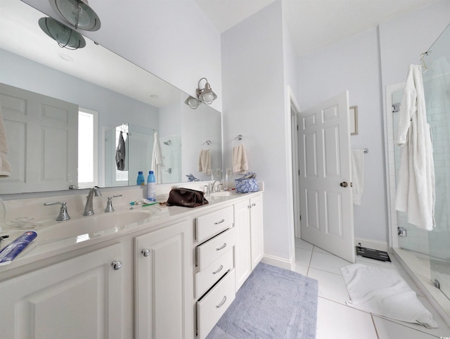 bathroom featuring vanity, tile patterned floors, and an enclosed shower