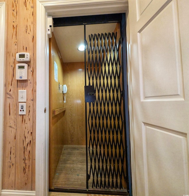 interior details featuring wooden walls