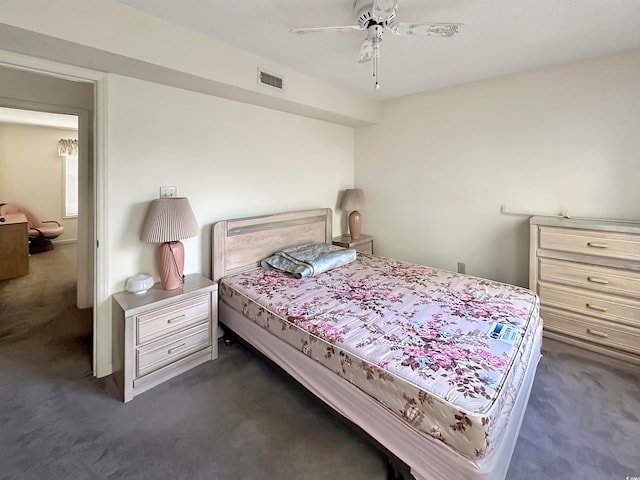 carpeted bedroom featuring ceiling fan