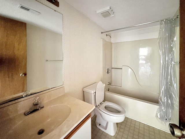 full bathroom featuring vanity, shower / bath combination with curtain, and toilet