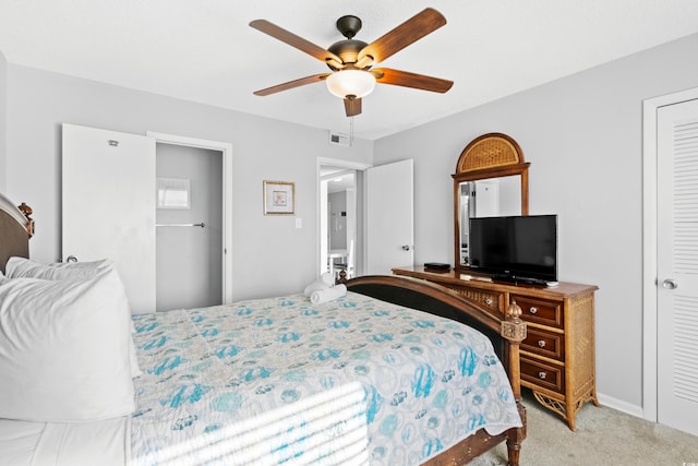 carpeted bedroom featuring ceiling fan