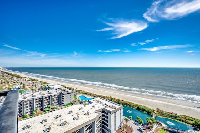 aerial view with a water view and a view of the beach