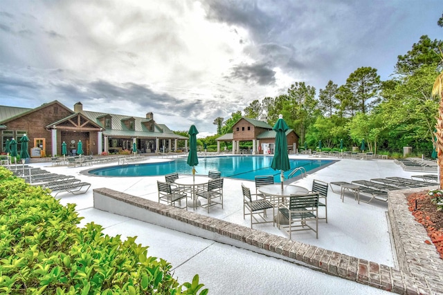 view of pool with a patio