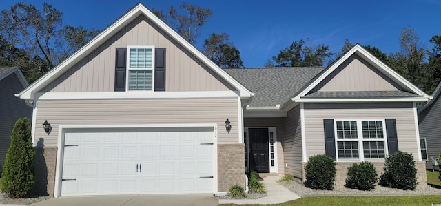 craftsman house with a garage