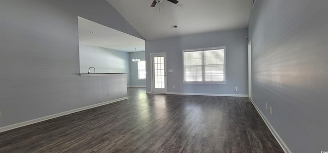 unfurnished room with dark wood-type flooring, ceiling fan, and lofted ceiling