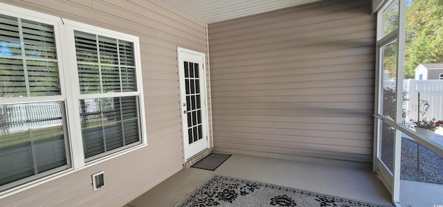 unfurnished sunroom with plenty of natural light