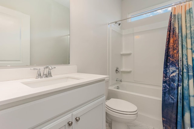 full bathroom with toilet, vanity, and shower / bath combo with shower curtain