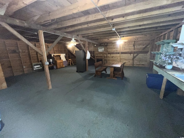 basement with ceiling fan