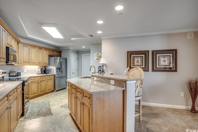 8500 Margate Cir Unit 2704, Myrtle Beach, SC 29572 - kitchen featuring stainless steel appliances, a sink, a kitchen bar, crown molding, and light stone counters