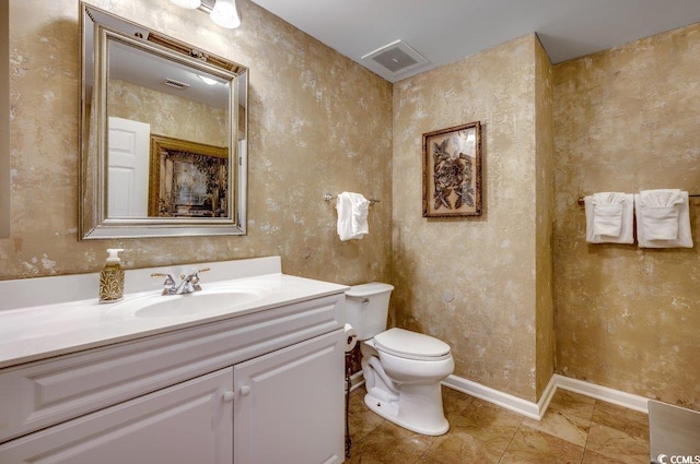 8500 Margate Cir Unit 2704, Myrtle Beach, SC 29572 - bathroom with toilet, vanity, baseboards, and tile patterned flooring