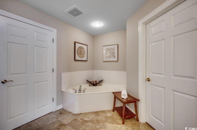 8500 Margate Cir Unit 2704, Myrtle Beach, SC 29572 - bathroom with a bath and baseboards