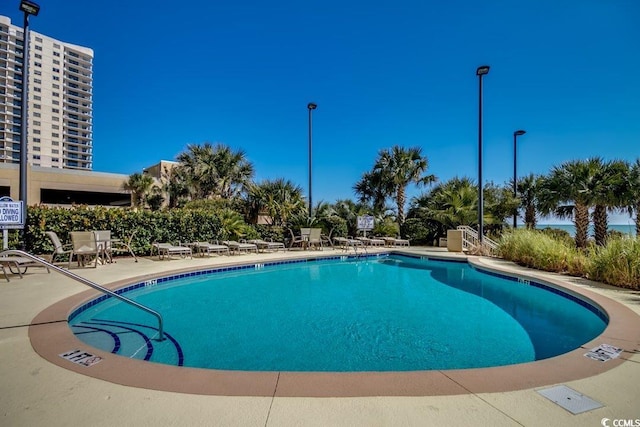 8500 Margate Cir Unit 2704, Myrtle Beach, SC 29572 - community pool featuring a patio area
