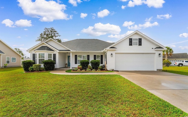 view of front of house with a front lawn and a garage