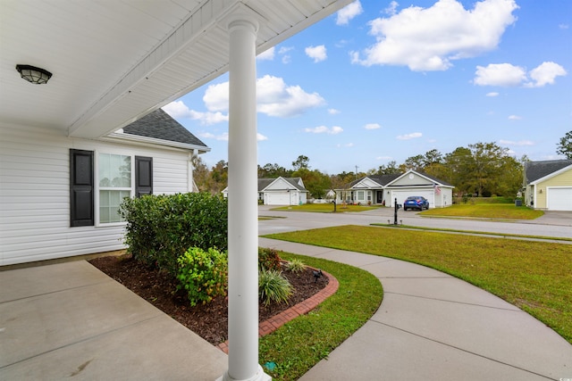 view of yard featuring a porch