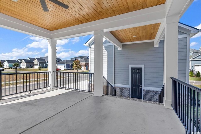 view of patio with a porch and ceiling fan