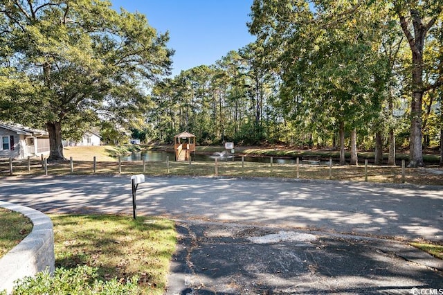 view of street featuring a water view