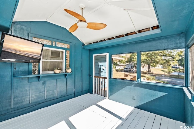 wooden deck featuring ceiling fan