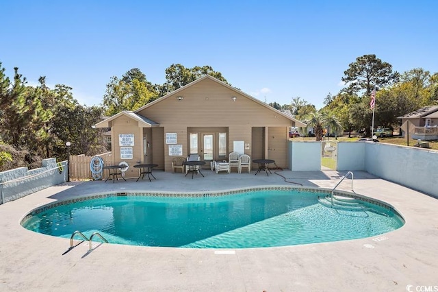 view of pool featuring a patio