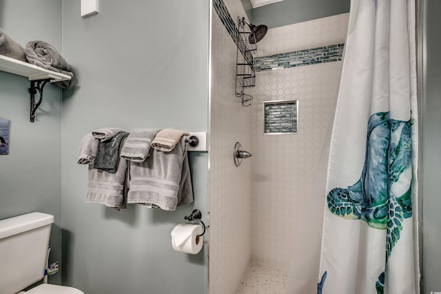 814 N Waccamaw Dr Unit 311, Garden City Beach, SC 29576 - bathroom featuring a stall shower and toilet