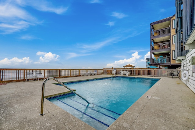 814 N Waccamaw Dr Unit 311, Garden City Beach, SC 29576 - community pool with a patio