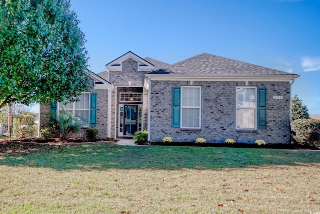 view of front of property with a front lawn