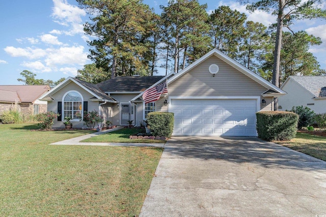 view of front of property featuring a front lawn and a garage