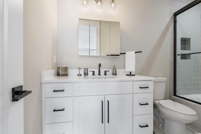 full bathroom featuring vanity, toilet, and enclosed tub / shower combo