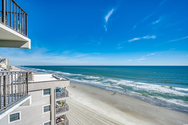 property view of water featuring a beach view