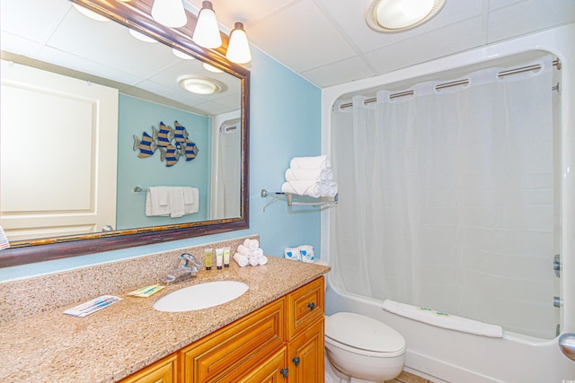 full bathroom featuring vanity, shower / bath combo, and toilet