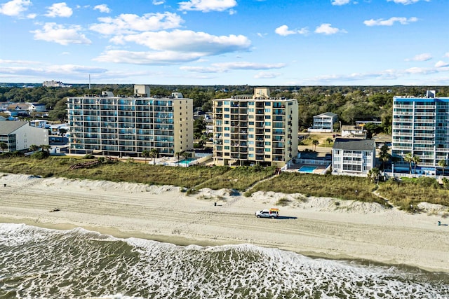 aerial view featuring a water view and a view of the beach